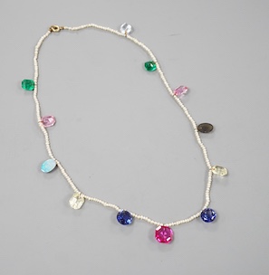 A multi coloured paste and opal doublet set baroque seed pearl necklace, 42cm.